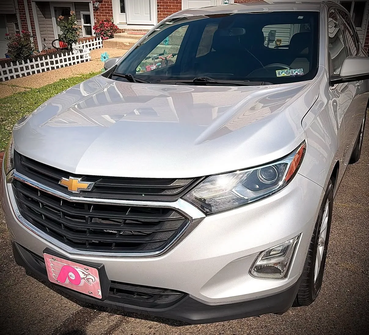 Front of a silver Chevrolet Equinox after a detail